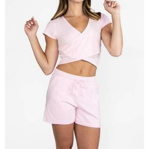 NEW BODY WRAPPERS short sleeve criss cross crop top in pink